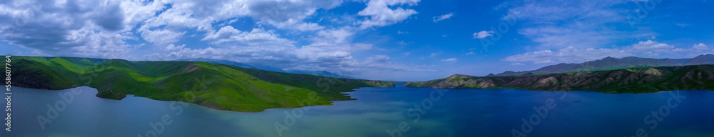 Панорама, вид на озеро с высоты, облака. Panorama, view of the lake from a height, clouds