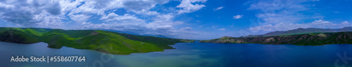 Панорама, вид на озеро с высоты, облака. Panorama, view of the lake from a height, clouds