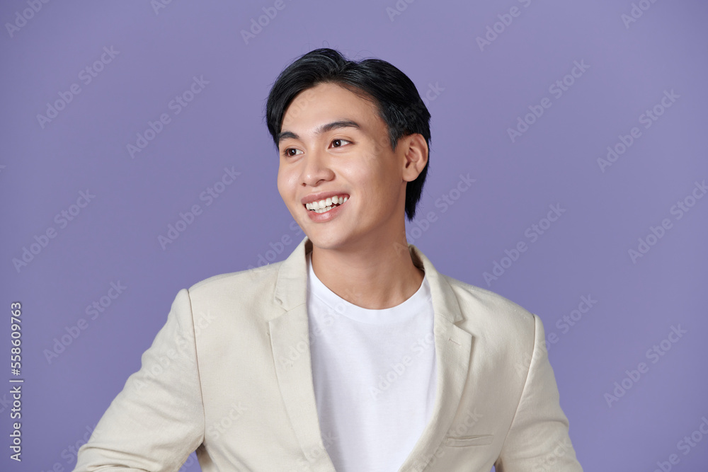 portrait of asian young smiling man standing on white background portrait of asian young smiling man standing on white background