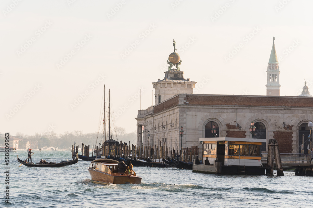 grand canal and architectural detail of Punta della Dogana in Venice, Italy 