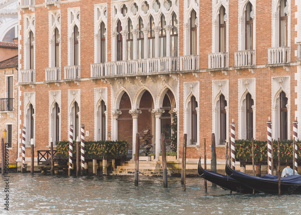 Charming architectural detail of buildings by the grand canal in Venice, Italy
