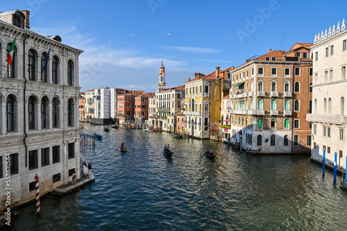 Life in Venezia  in the port with ships  boats and gondolas  lovely place  grand Canal in the summer  poster visual