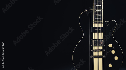 Guitar body on black background