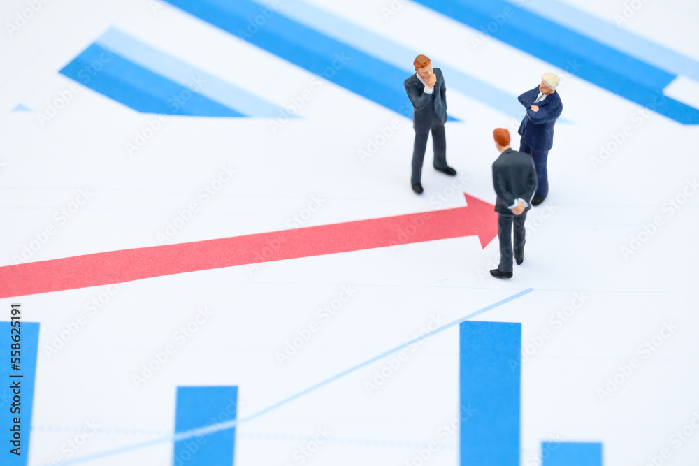 concept of Businessmans group standing on top of a chart showing positive results progress, red arrow pointing success attributed. thinking about positive results background presentation concept of Businessmans group standing on top of a chart showing positive results progress, red arrow pointing success attributed. thinking about positive results background presentation