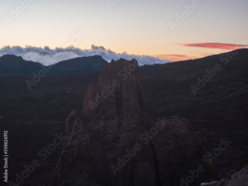 Red sunset light at Roques de Garcia with La Catedral volcanic rock formation at El Teide national park, Tenerife Canary islands, Spain. © Kristyna