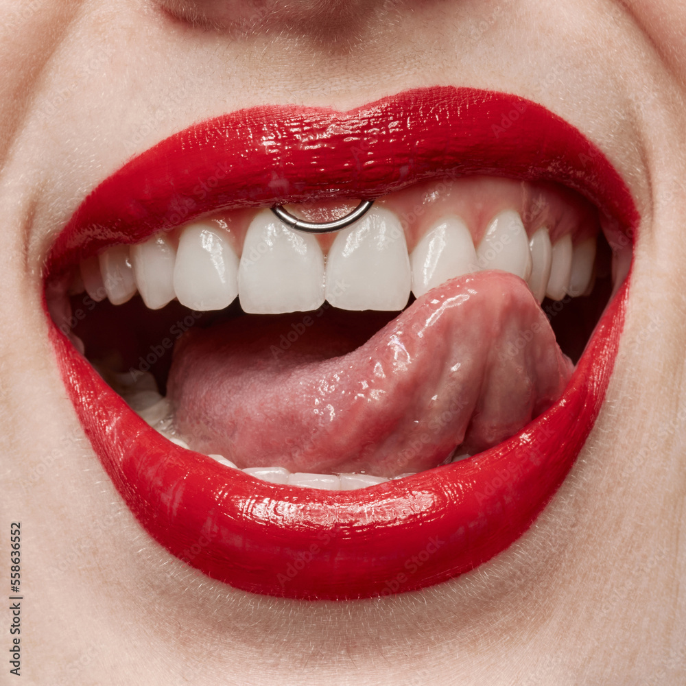 © Lustre Art Group - Perfect straight white teeth. Close-up open smiling girl's mouth with bright red lipstick. Healthy teeth and smile. Freshness in the mouth. © Lustre Art Group - Perfect straight white teeth. Close-up open smiling girl's mouth with bright red lipstick. Healthy teeth and smile. Freshness in the mouth.