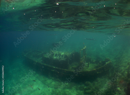 a small sunken ship on the island of Curaçao