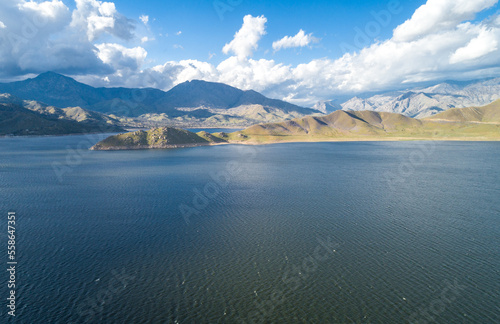 Isabella Lake in California. Beautiful Cloudy Sky and Mountain in Background. Bright Sunny Day. USA