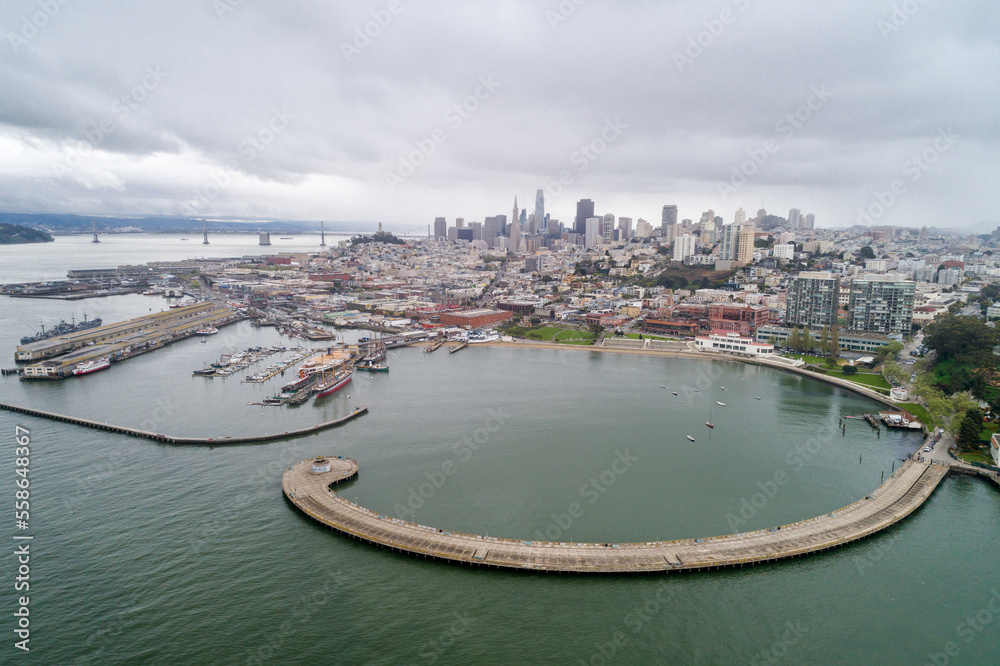 Aquatic Park Pier , Cove and Municipal Pier in San Francisco. Maritime National Historic Park in Background. Cityscape of San Francisco. California. Drone - obrazy, fototapety, plakaty 