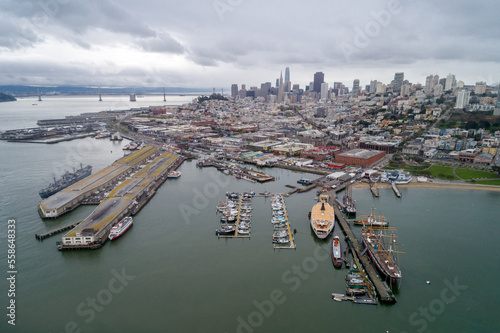 Aquatic Park Pier   Cove and Municipal Pier in San Francisco. Maritime National Historic Park in Background. Cityscape of San Francisco. California. Drone