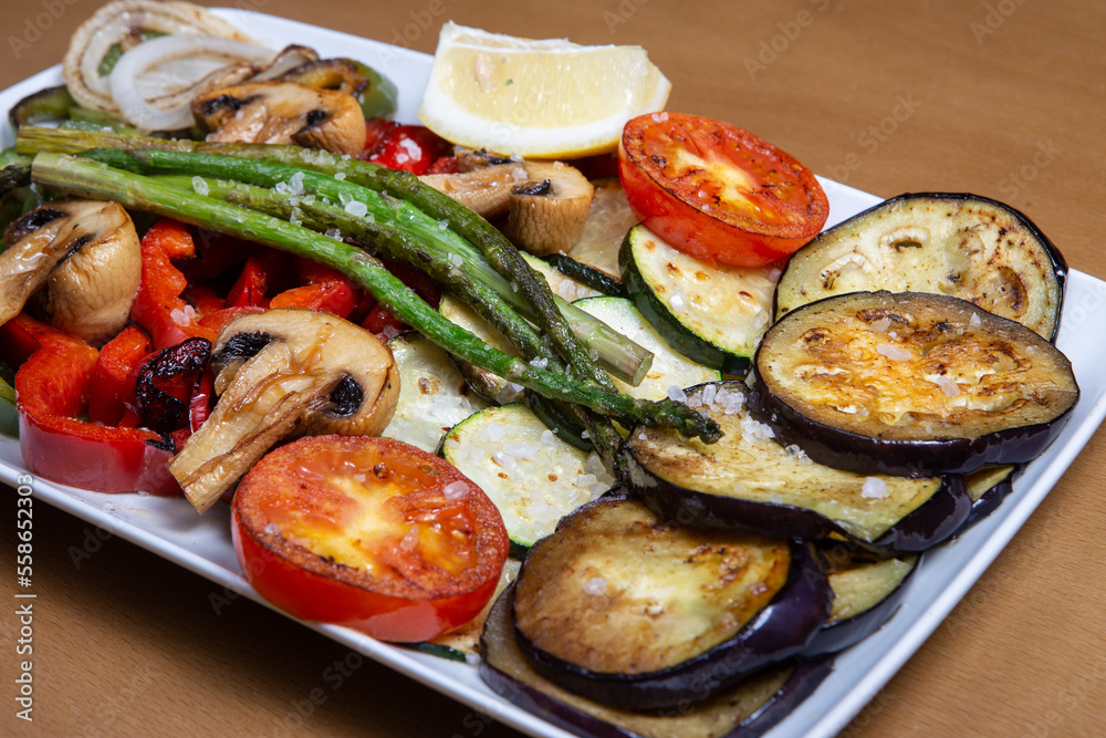 Grilled vegetables closeup in a pan grill. Grilled vegetables closeup in a pan grill.