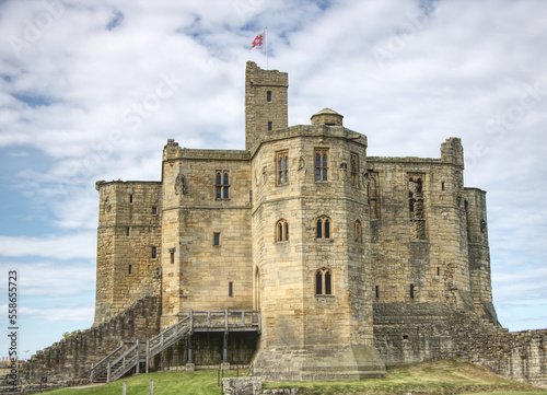 warkworth, uk.  castle with blue sky in the background
