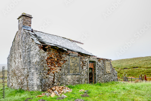 stone building in Yorkshire Dales United Kingdom in the background
