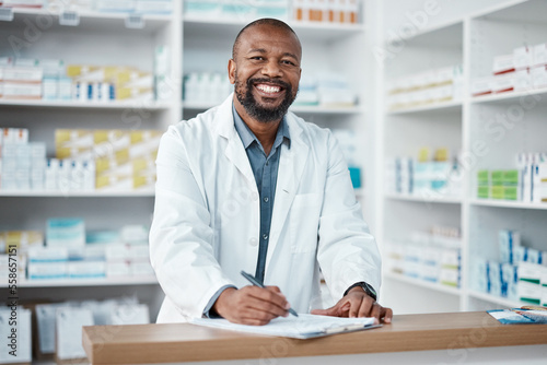 Pharmacy, portrait and black man with clipboard, medicine and pill prescription. African American male, pharmacist and medical professional writing, make notes for stock and inventory for healthcare.
