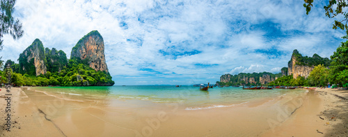 Long tail boats at Railay beach  Krabi  Thailand. Tropical paradise  turquoise water and white sand.