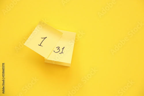 Calendar page with date on a yellow background.