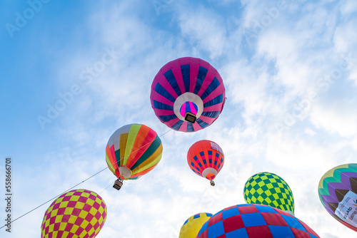 A hot-air balloon festival kicked off on January 22, 2022 to celebrate the first founding anniversary of Thu Duc City, colorful hot air balloon in blue sky