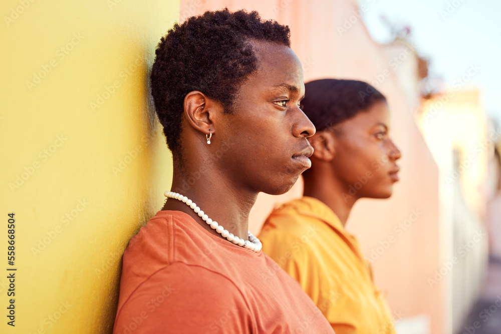 Urban fashion, African people and couple of friends relax with designer brand clothes, casual style and luxury apparel. Gen z aesthetic, color and profile of black woman and man on orange yellow wall Urban fashion, African people and couple of friends relax with designer brand clothes, casual style and luxury apparel. Gen z aesthetic, color and profile of black woman and man on orange yellow wall