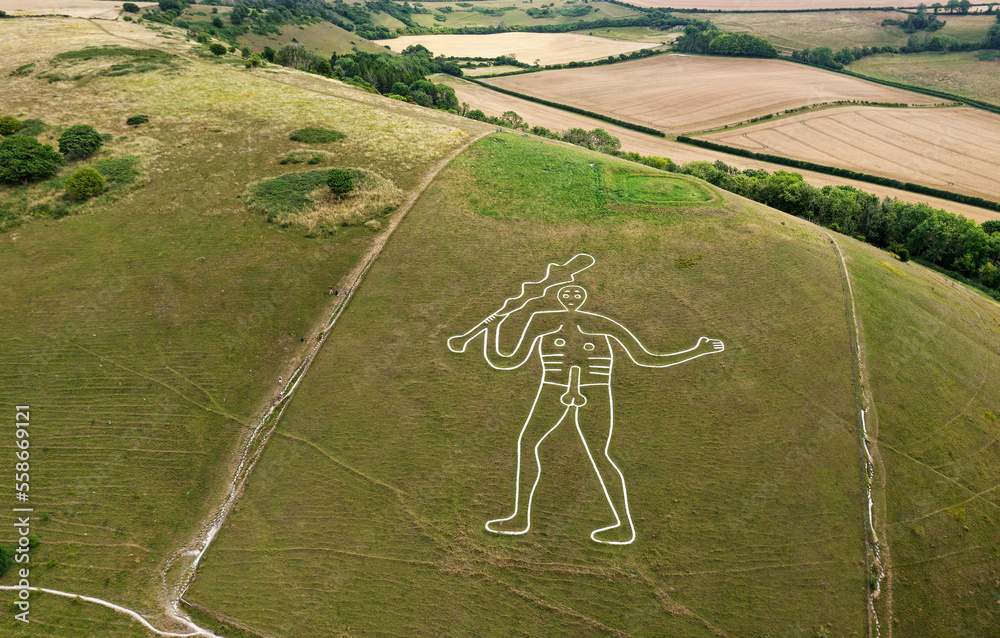 Cerne Abbas Giant, Dorset. Ancient male phallic chalk hill figure. 55 metres high. Above head is Iron Age earthwork called the Trendle or frying pan