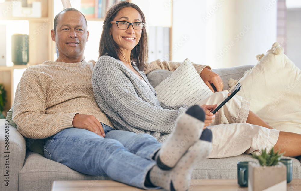 Mature couple, tablet and relax portrait on sofa together for love, support and romance bonding in living room at home. Man smile, happy woman, and romantic quality time on couch with tech device Mature couple, tablet and relax portrait on sofa together for love, support and romance bonding in living room at home. Man smile, happy woman, and romantic quality time on couch with tech device