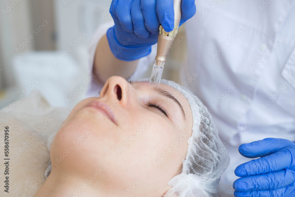 Rejuvenating facial treatment. Model is receiving lifting therapy in SPA beauty salon. Exfoliating, stimulating and hydrating. Rejuvenating facial treatment. Model is receiving lifting therapy in SPA beauty salon. Exfoliating, stimulating and hydrating.