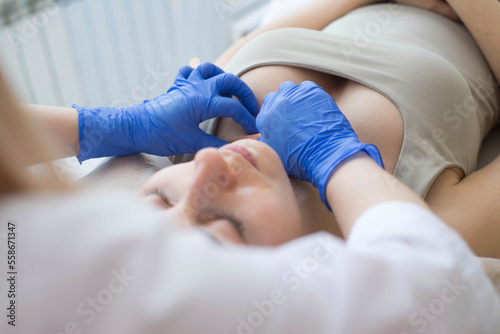 close up of a nurse holding a patient