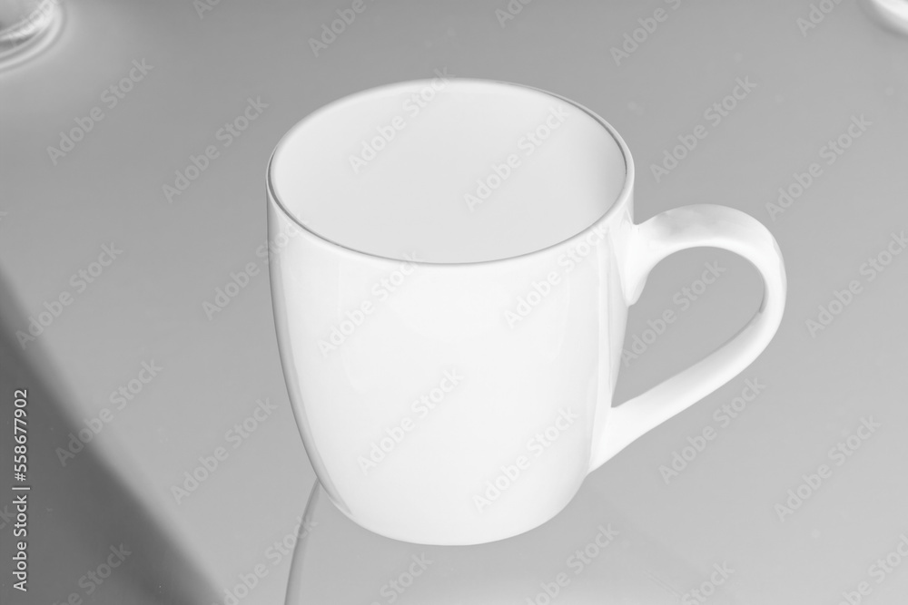 high key image of a cup of coffee with interesting shadows high key image of a cup of coffee with interesting shadows