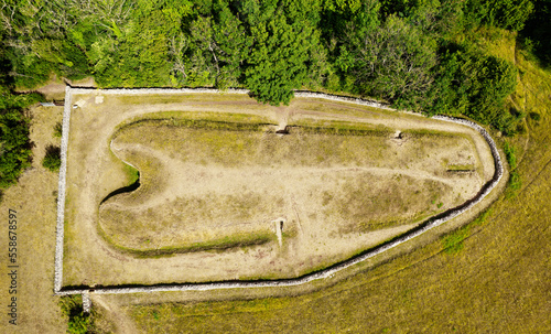 Belas Knap 5000 year Neolithic chambered long barrow near Winchcombe, UK. Cotswold Severn Cairn type. Showing burial chamber entrances and forecourt