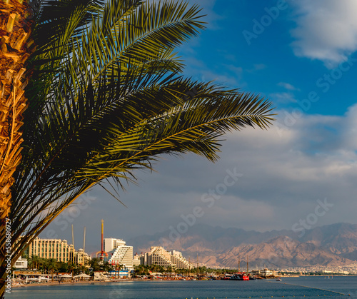 Central public beach in Eilat - famous tourist resort and recreational city located on the Red Sea, Israel