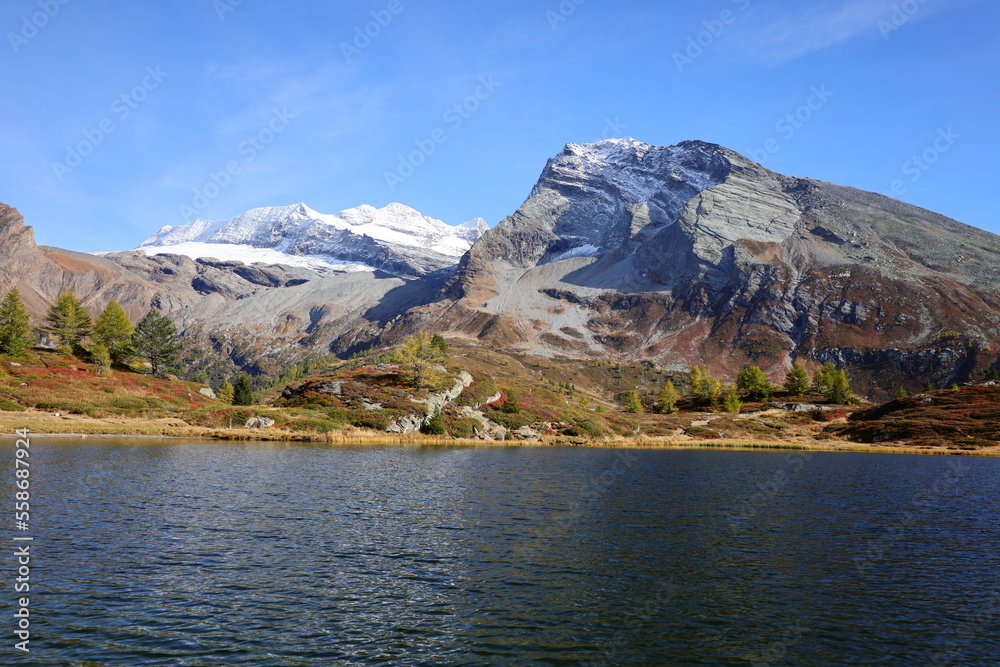 View on a lake in the Simplon Pass is a high mountain pass between the Pennine Alps and the Lepontine Alps in Switzerland.