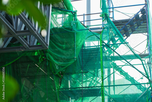 Green shading Net was used prevent construction sewage around construction site. and scaffolding