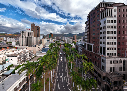 Unusual cityscape about The capital city of Mauritius island. This is the duke of Edinburgh street. It has tzhe government house too. photo