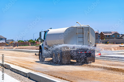 Watering machine. Road construction. Repair.