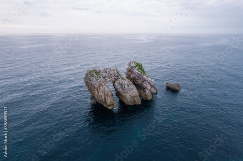 Urro del Manzano, aerial view of special formation of reefs at sea in Santander, Spain photo