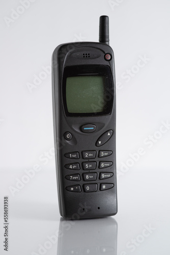 Retro black mobile cell phone handset isolated