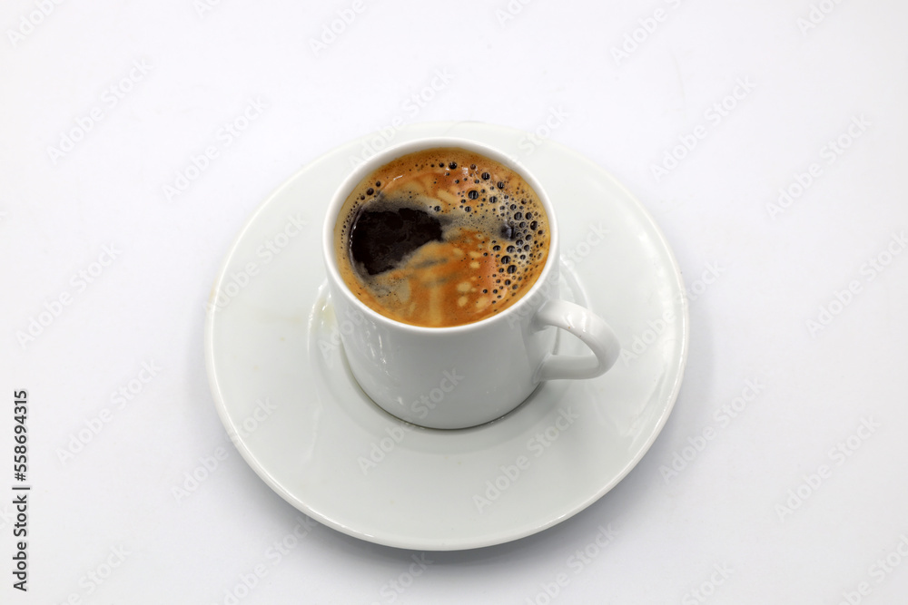 cup of black coffee on the white table cup of black coffee on the white table