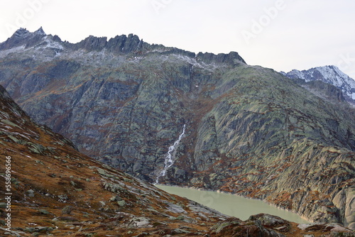 View on a lake in the Grimsel Pass which is a mountain pass in Switzerland, crossing the Bernese Alps at an elevation of 2,164 metres