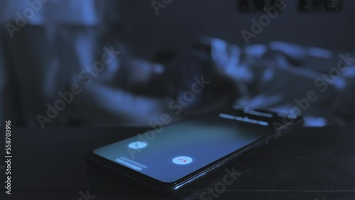 infidelity love affair couple sleeping on bed receives phone call from the lover mistress,cheating concept