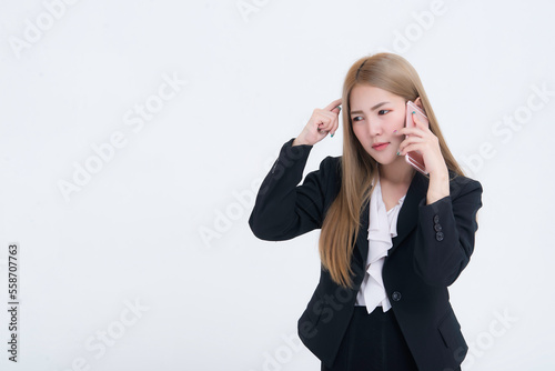 Asian business woman talk telephone about serious work on white background,Stress people concept