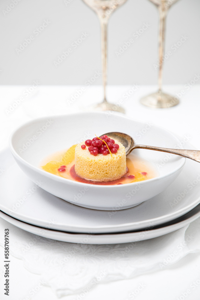 Mandarin gazpacho dessert served in a white bowl Mandarin gazpacho dessert served in a white bowl