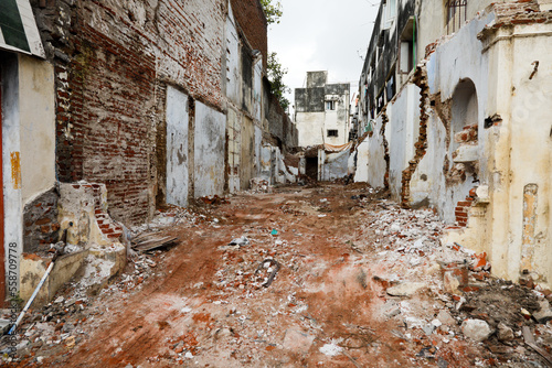 Street with ruins of demolished houses. Chennai, India