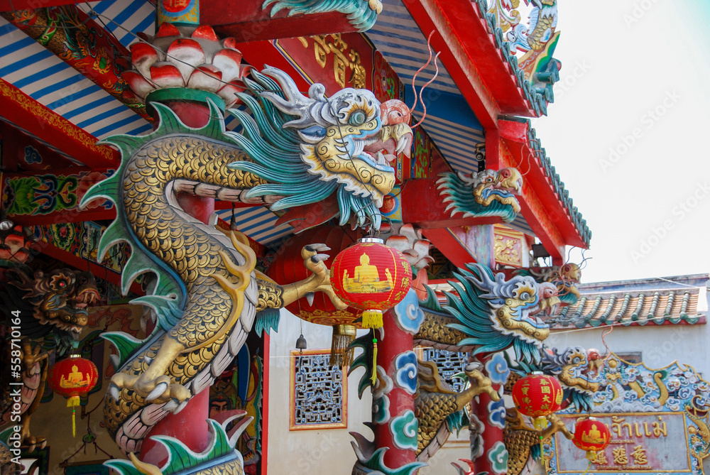 Details of the dragon decoration and lanterns of a Chinese temple in Ayutthaya, Thailand Details of the dragon decoration and lanterns of a Chinese temple in Ayutthaya, Thailand
