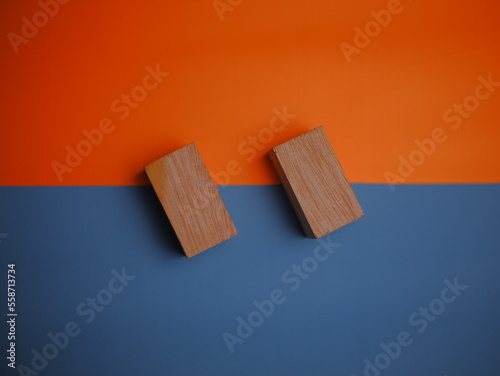 Fototapeta Naklejka Na Ścianę i Meble -  Wooden blocks on a light two-tone background, wooden cubes