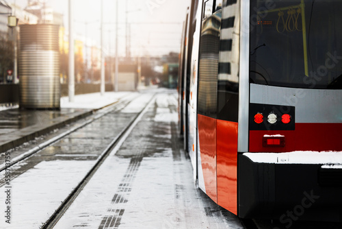 Modern red city tram in Vienna Austria. Public Streetcar transportation