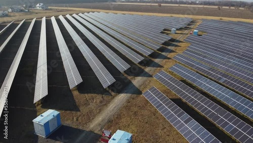 Aerial view of Solar Panels Farm (solar cell) with sunlight