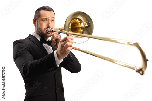Young man playing a trombone photo