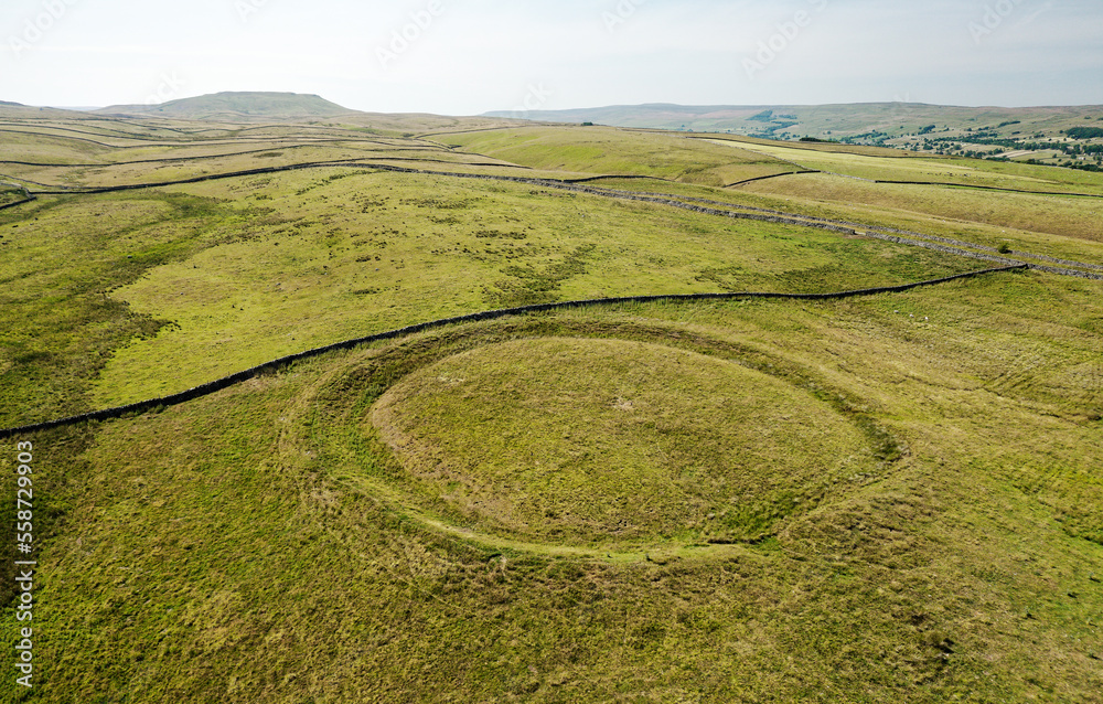 Castle Dykes prehistoric Neolithic henge near Aysgarth in Yorkshire Dales. External bank internal ditch approx. 80m diameter. View N.W. up Wensleydale