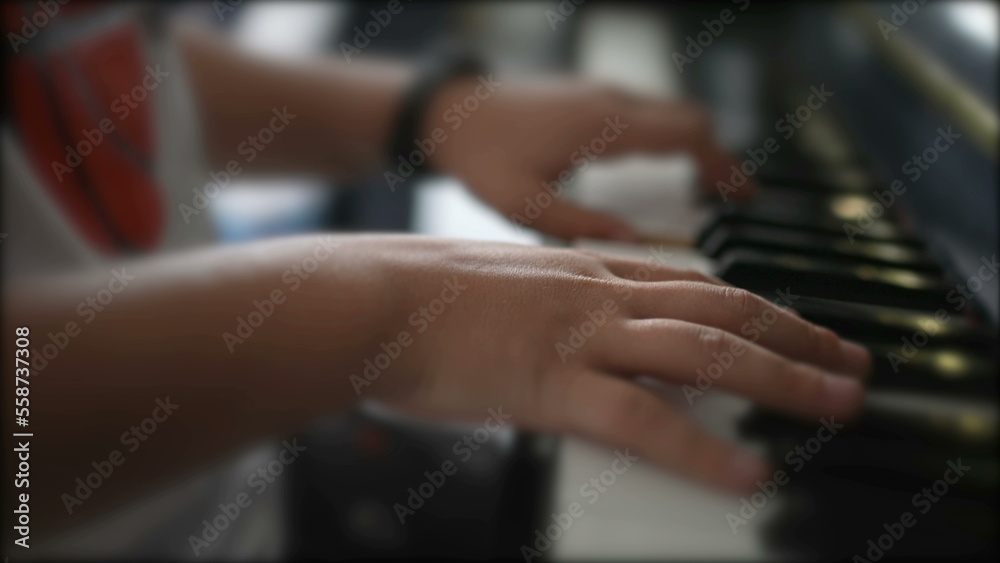 Obraz premium Child hands playing piano close-up4