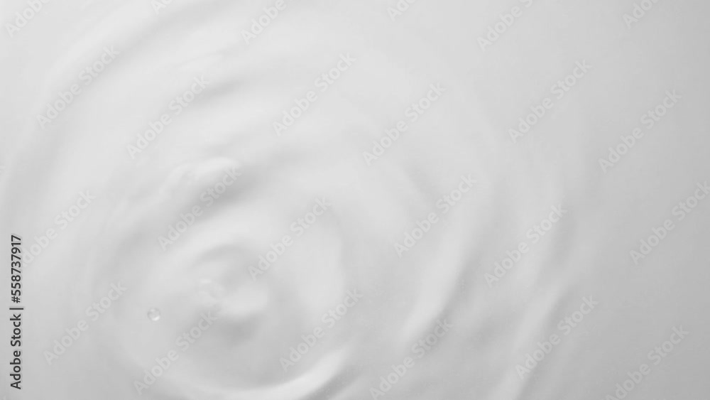 Water drop falling down and making circles on surface. Slow motion. Closeup Water drop falling down and making circles on surface. Slow motion. Closeup