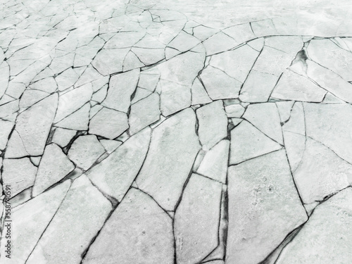 Aerial view of ice cracks in the frozen Dingvallavatn lake, in Dingvellir national park, Blaskogabyggo, Iceland. photo
